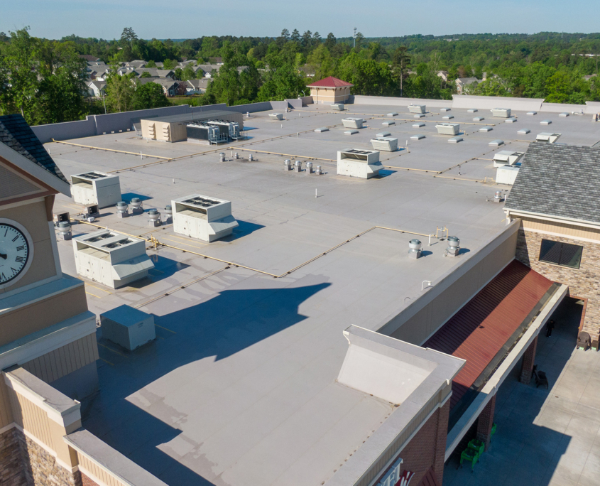 Drone Images Of Tpo Flat Commercial Roof With Metal Panels