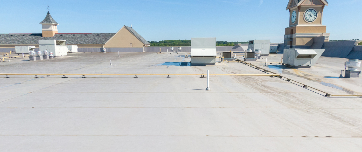 Drone Images Of Tpo Flat Commercial Roof With Metal Panels New & Existing Construction Building