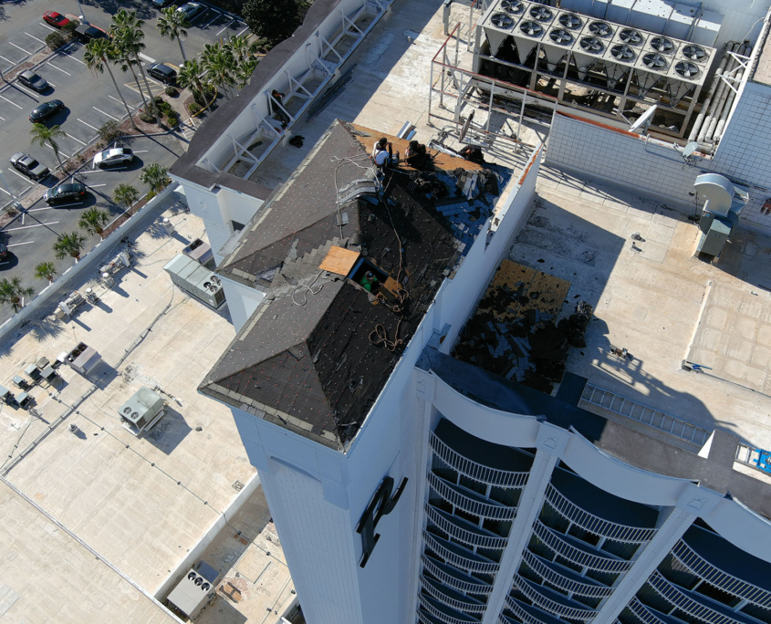 Top Down View Roof Work Parking Lot In Background